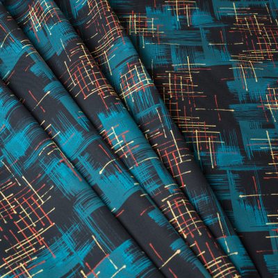 mid century furnishing fabric in teal and black